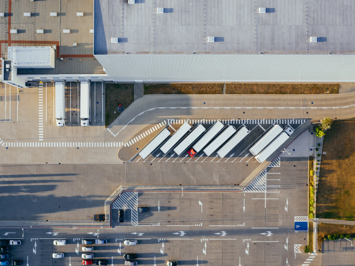 Trailers loading at a distribution centre, seen from above